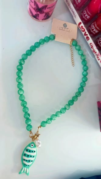 collar pez turquesa